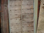 Antico portoncino toscano arreda interno come scorrevole